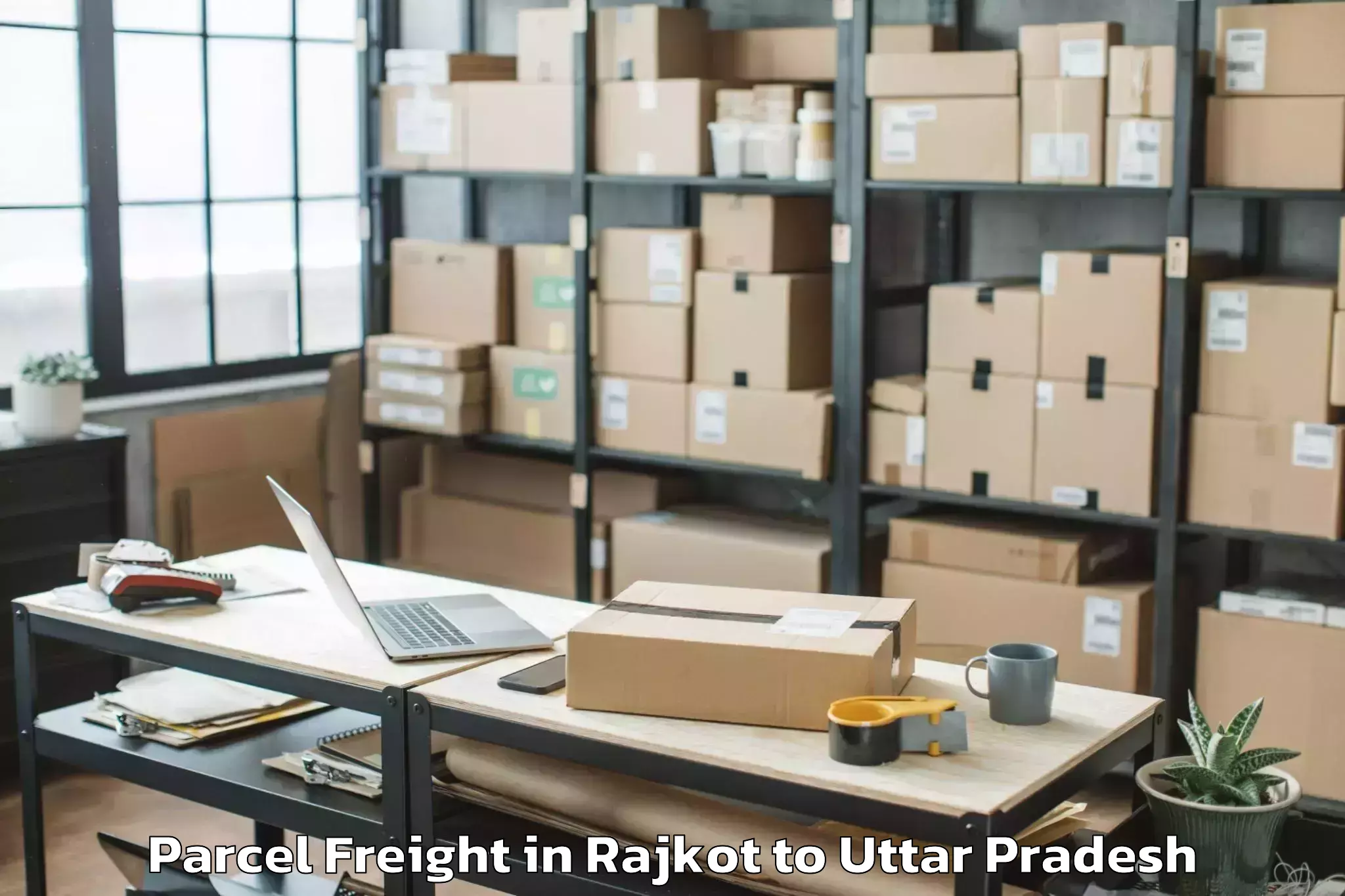 Book Rajkot to Koraon Parcel Freight